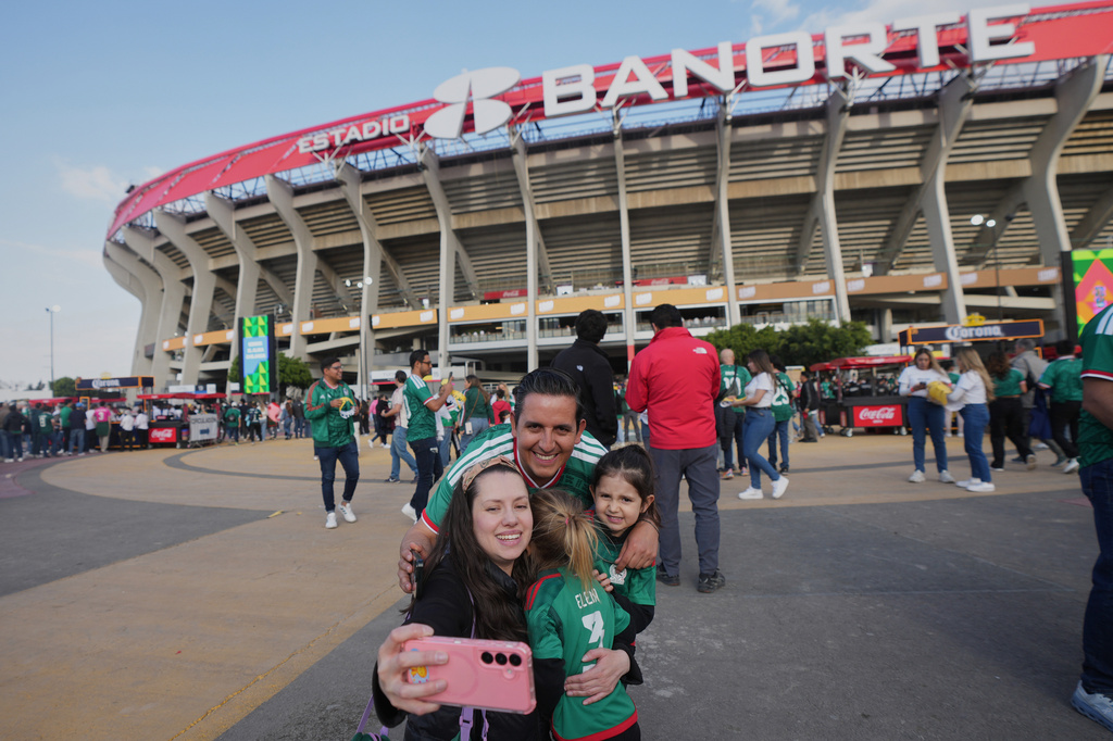 FILE - Fans arrive to the Azteca Stadium for the international friendly soccer match between Mexico and Portugal in Mexico City, Saturday, March 28, 2026. (AP Photo/Fernando Llano, File)