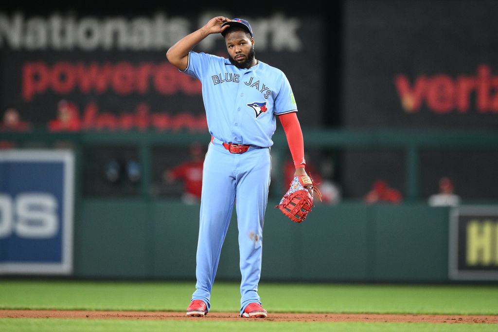 Toronto Blue Jays first baseman Vladimir Guerrero Jr. looks on during the first inning of a baseball game against the Washington Nationals, Tuesday, July 28, 2026, in Washington. (AP Photo/Nick Wass)