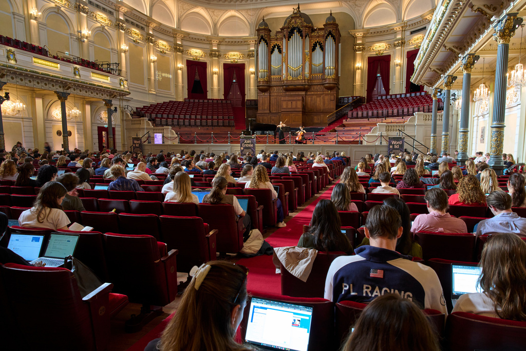 Students use their laptops while studying with music at Concertgebouw in Amsterdam, Netherlands, on March 5, 2026. (AP Photo/Peter Dejong)
