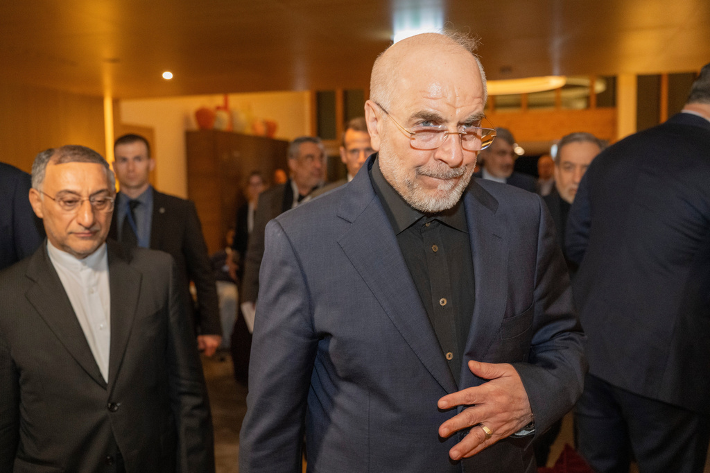Speaker of the Islamic Parliament of Iran Mohammed Bagher Ghalibaf, center, arrives at the Buergenstock resort in Obbuergen, near Lucerne, Switzerland, early Sunday, June 21, 2026. (Urs Flueeler/Keystone, Pool via AP)