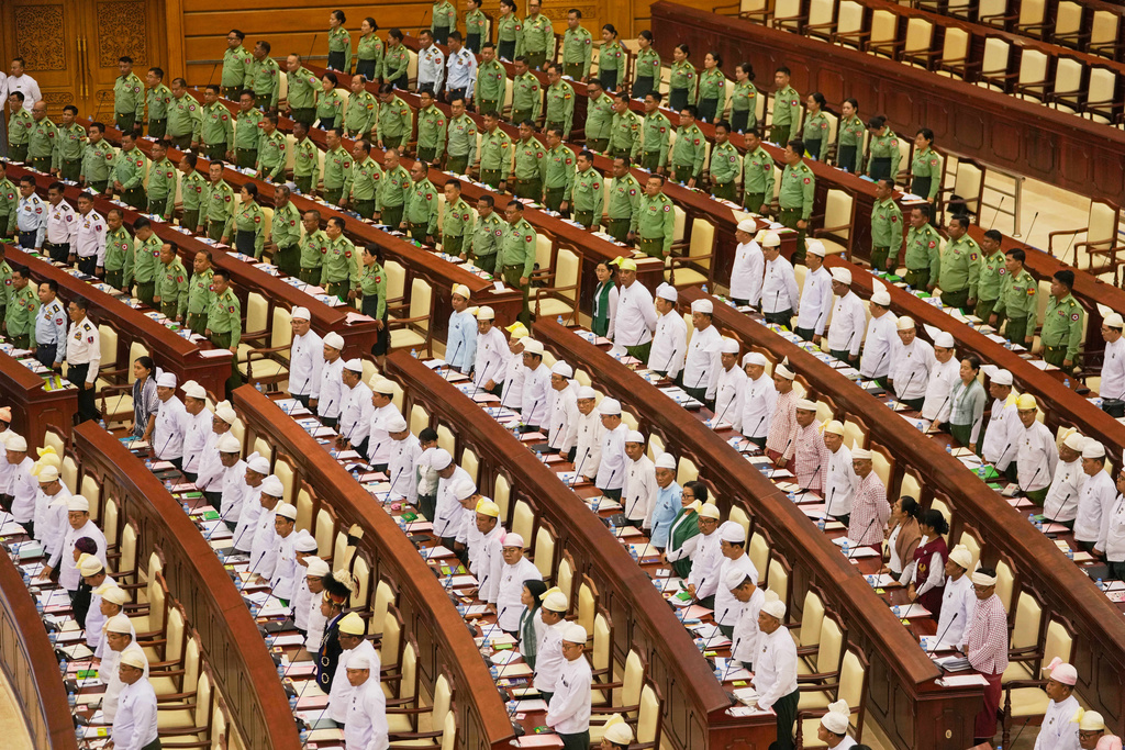 Myanmar's military representatives and Lawmakers take oath during a parliament session at Lower House in Naypyitaw, Myanmar, Monday, March 16, 2026. (AP Photo/Aung Shine Oo)