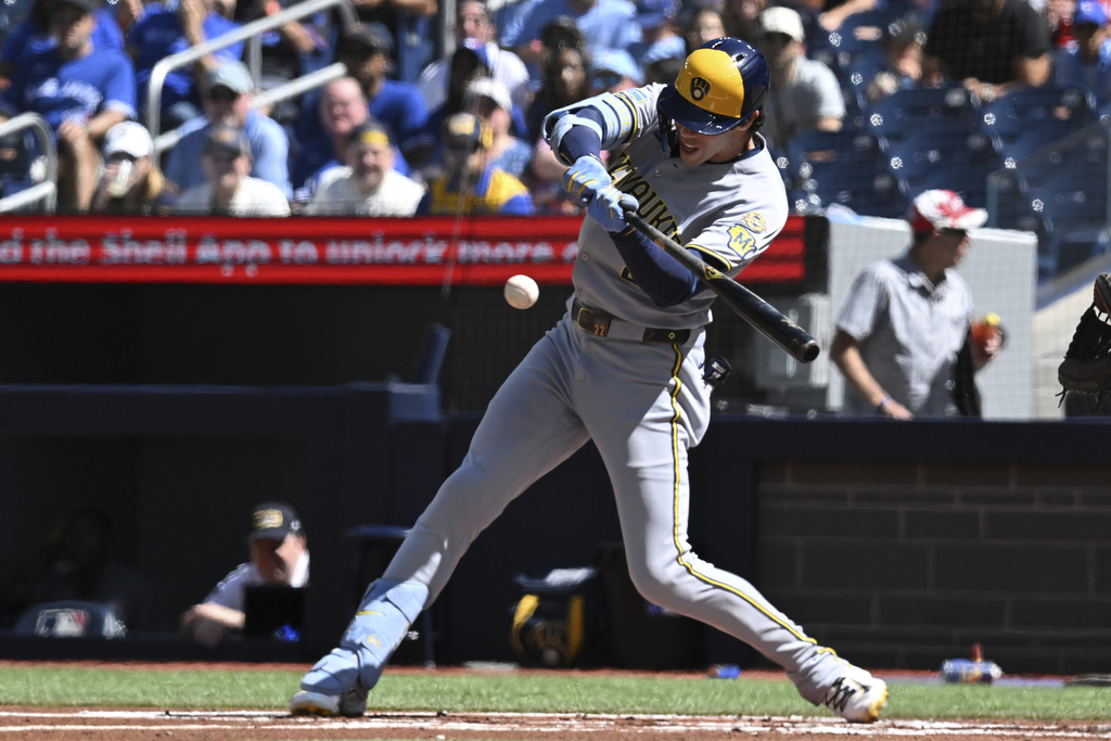 Milwaukee Brewers designated hitter Christian Yelich (22) grounds out against the Toronto Blue Jays during the first inning of a baseball game in Toronto on Sunday Aug. 31, 2025. (Jon Blacker/The Canadian Press via AP)