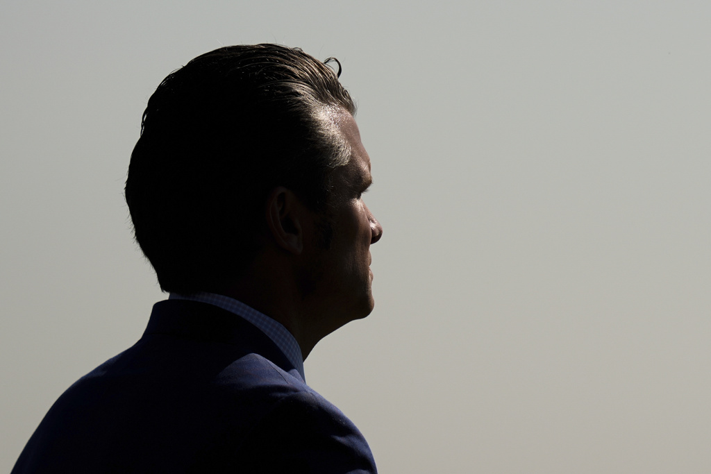 Defense Secretary Pete Hegseth reviews troops during the POW/MIA National Recognition Day Ceremony at the Pentagon, Friday, Sept. 19, 2025, in Washington. (AP Photo/Julia Demaree Nikhinson)