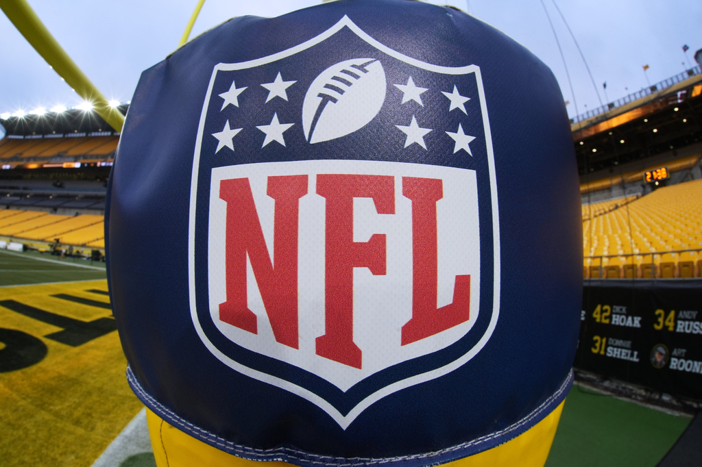 FILE - The NFL logo is displayed on a goal post at Acrisure Stadium before an NFL football game between the Pittsburgh Steelers and the Baltimore Ravens in Pittsburgh Jan. 4, 2026. (AP Photo/Gene J. Puskar, File)