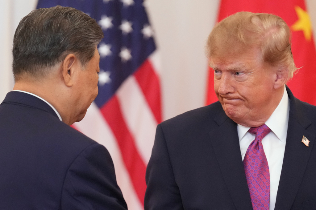 President Donald Trump shakes hands with China's President Xi Jinping during an arrival ceremony in the Grand Foyer of the White House, Thursday, Sept. 24, 2026, in Washington. (AP Photo/Jacquelyn Martin)