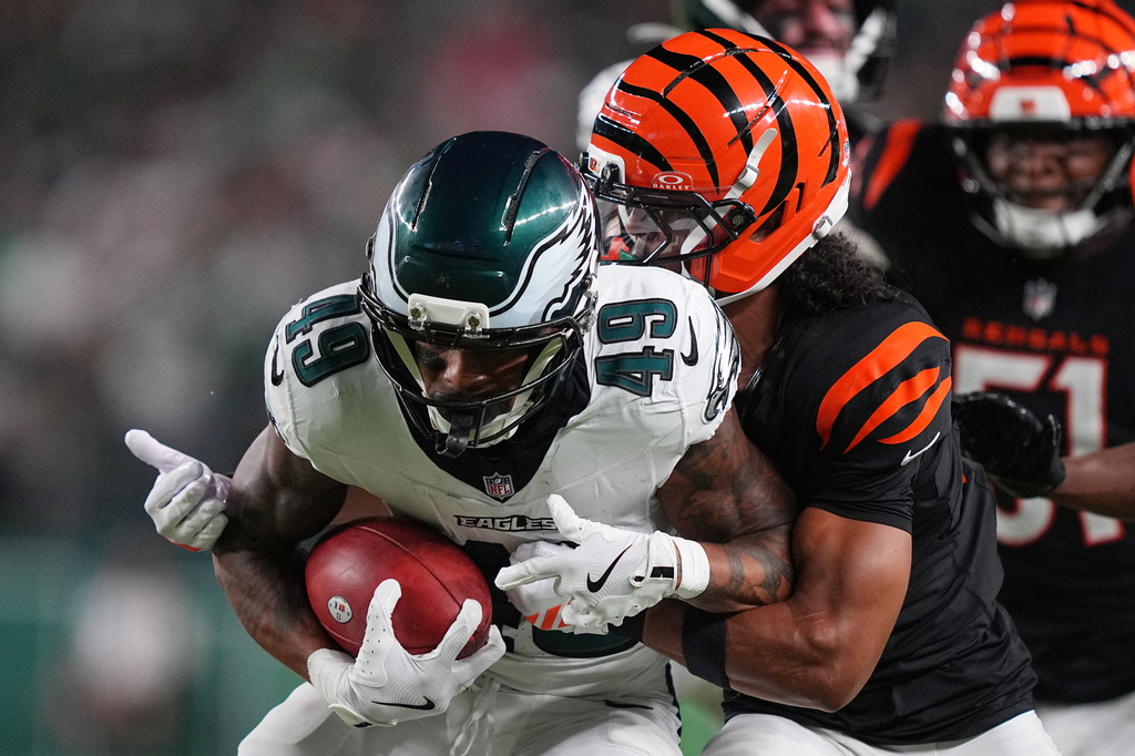 Philadelphia Eagles' Erik Ezukanma tries to get past Cincinnati Bengals defensive back Bralyn Lux (21) during the first half of a preseason NFL football game Friday, Aug. 28, 2026, in Philadelphia. (AP Photo/Matt Rourke)