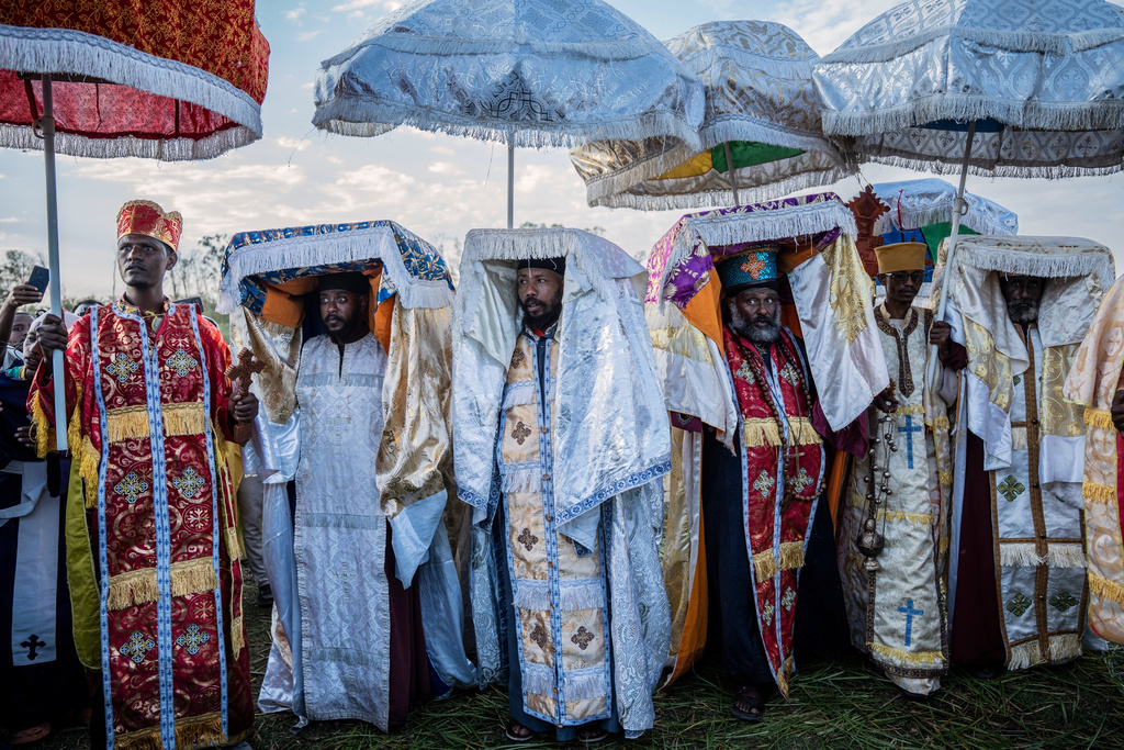High priests celebrate Timket, the Ethiopian Epiphany, on the shore of lake Dembel, in Batu, Ethiopia, Sunday, Jan. 18, 2026. (AP Photo/Amanuel Sileshi)