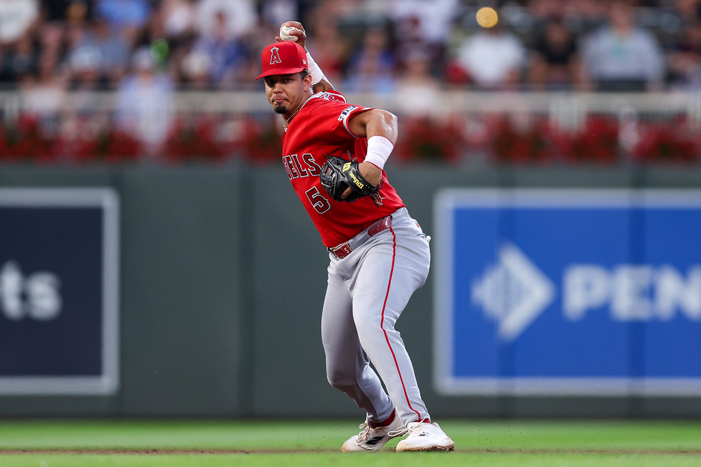 Los Angeles Angels third baseman Vaughn Grissom throws to first base to get out Minnesota Twins' Kody Clemens during the sixth inning of a baseball game, Friday, July 10, 2026, in Minneapolis. (AP Photo/Matt Krohn)