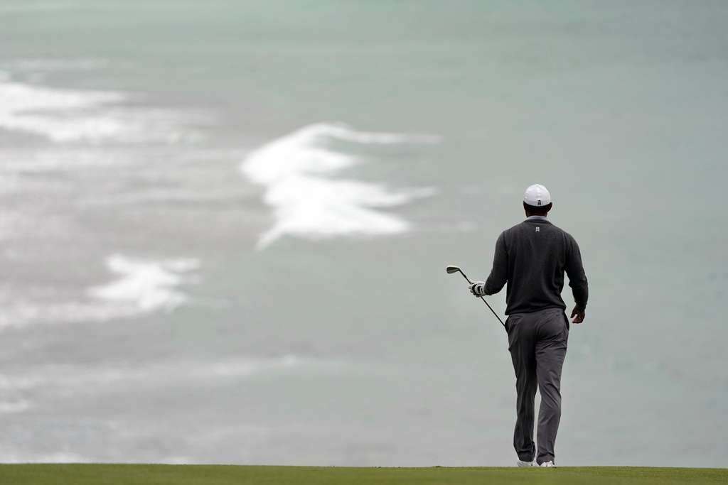 FILE - Tiger Woods walks to the ninth green during the third round of the U.S. Open Championship golf tournament, June 15, 2019, in Pebble Beach, Calif. (AP Photo/Carolyn Kaster, File)