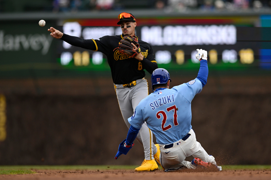 Pittsburgh Pirates shortstop Konnor Griffin (6) throws to first base after forcing out Chicago Cubs' Seiya Suzuki at second base during the second inning of a baseball game in Chicago, Friday, April 10, 2026. (AP Photo/Paul Beaty)