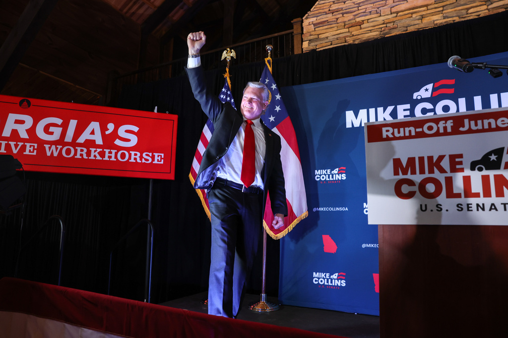 U.S. Rep. Mike Collins, R-Ga., walks out to speak at his primary election watch party in Jackson, Ga. on Tuesday, May 19, 2026. (Arvin Temkar/Atlanta Journal-Constitution via AP)