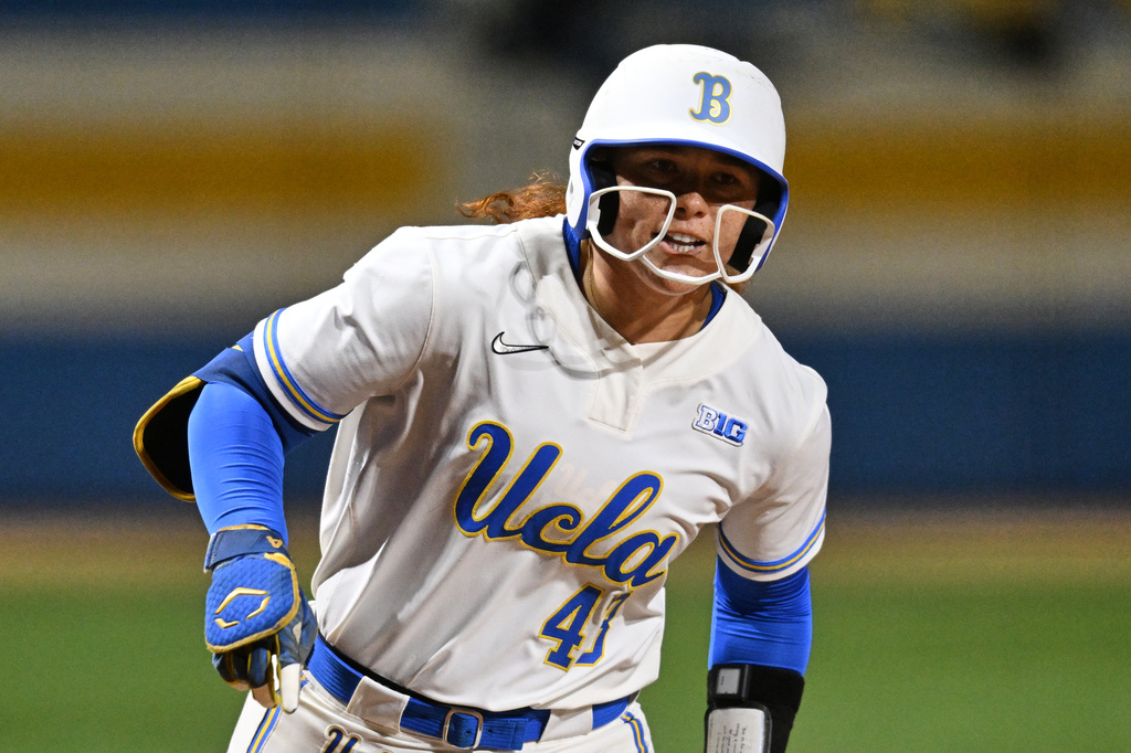 FILE - UCLAs' Megan Grant (43) runs the bases during an NCAA softball game on Friday, March 6, 2026, in Los Angeles. (AP Photo/John McCoy, File)