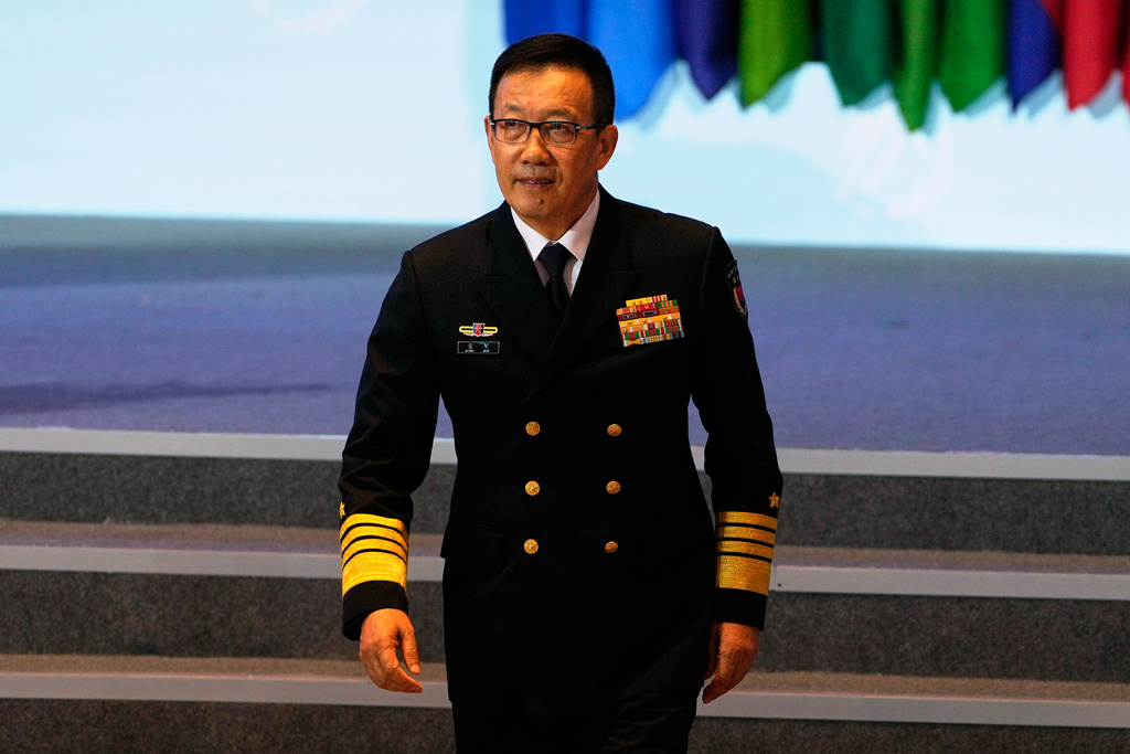 Chinese Defense Minister Dong Jun walks down the stage after speaking at China's annual security and defense dialogue, the Xiangshan Forum, in Beijing, China, Thursday, Sept. 18, 2025. (AP Photo/Ng Han Guan)