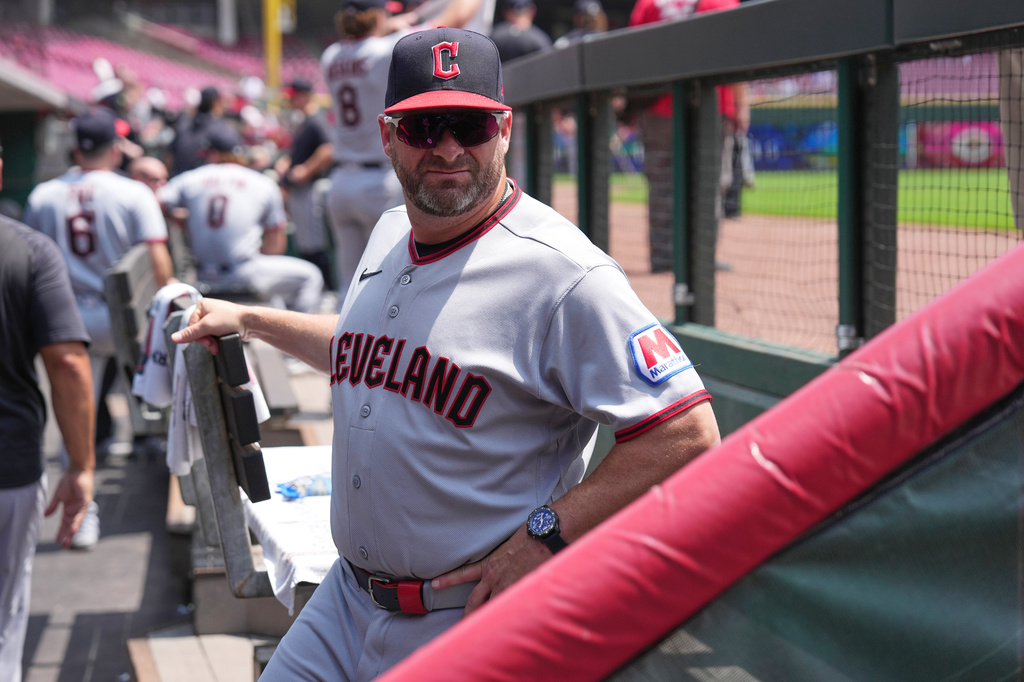 Cleveland Guardians manager Stephen Vogt stands in the dugout before the first baseball game of a doubleheader against the Cincinnati Reds, Tuesday, July 28, 2026, in Cincinnati. (AP Photo/Kareem Elgazzar)