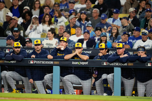 Members of the Milwaukee Brewers watch during the eighth inning in Game 4 of baseball's National League Championship Series against the Los Angeles Dodgers, Friday, Oct. 17, 2025, in Los Angeles. (AP Photo/Ashley Landis) Members of the Milwaukee Brewers watch during the eighth inning in Game 4 of baseball's National League Championship Series against the Los Angeles Dodgers, Friday, Oct. 17, 2025, in Los Angeles. (AP Photo/Ashley Landis)