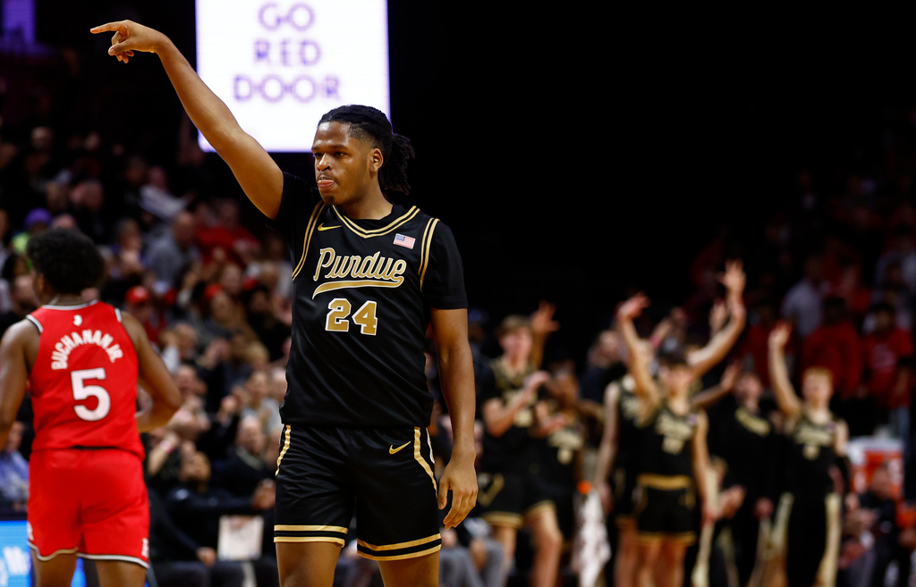 Purdue guard Gicarri Harris (24) reacts after making a three point shot against Rutgers during the first half of an NCAA college basketball game, Tuesday, Dec. 2, 2025, in Piscataway, N.J. (AP Photo/Noah K. Murray)