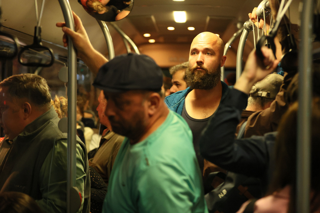 A 28-year-old digital content marketer who recently moved out of Russia rides a subway car in Tbilisi, Georgia, Tuesday, Sept. 8, 2026. He asked not to be identified because of security concerns. (AP Photo/Zurab Tsertsvadze)