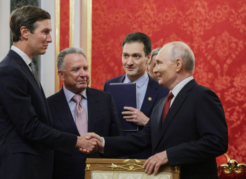 President Vladimir Putin, right, greets U.S. President Donald Trump's envoys Steve Witkoff, second left, and Jared Kushner prior to talks at the Senate Palace of the Kremlin in Moscow, on Saturday, Sept. 5, 2026. (Gavriil Grigorov/Sputnik/Kremlin Pool Photo via AP)