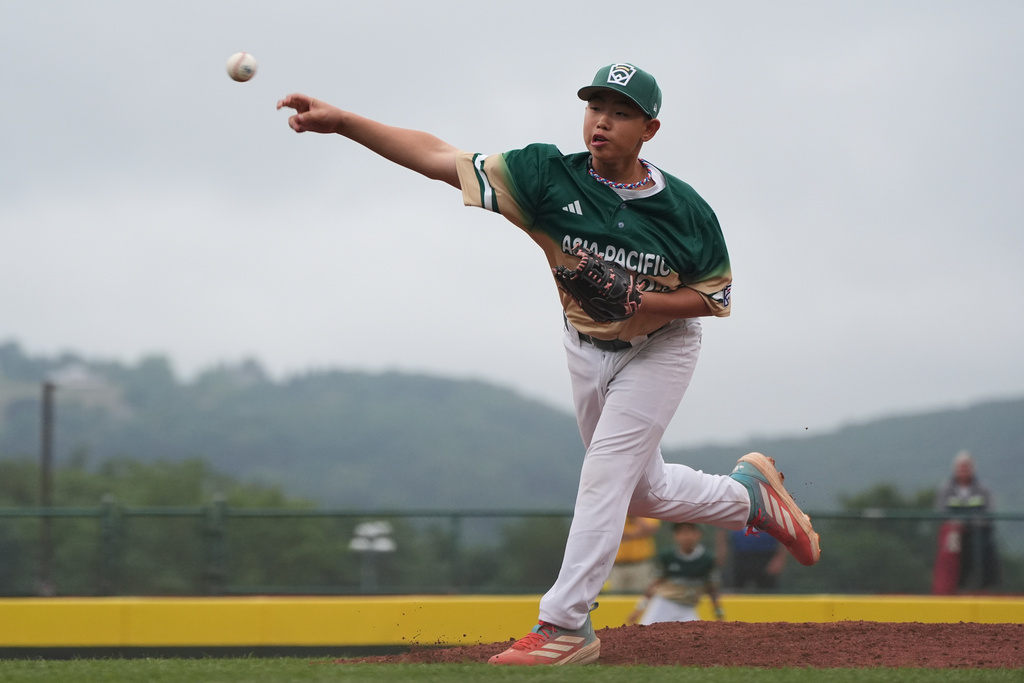 Taiwan's Chen Qi-Sheng pitches against Venezuela during the fifth inning of a baseball game at the Little League World Series, Wednesday, Aug. 20, 2025, in South Williamsport, Pa. (AP Photo/Caleb Craig)