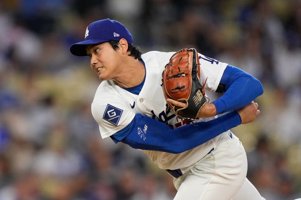 Los Angeles Dodgers starting pitcher Shohei Ohtani throws to the plate during the second inning of a baseball game against the Miami Marlins, Tuesday, April 28, 2026, in Los Angeles. (AP Photo/Mark J. Terrill)