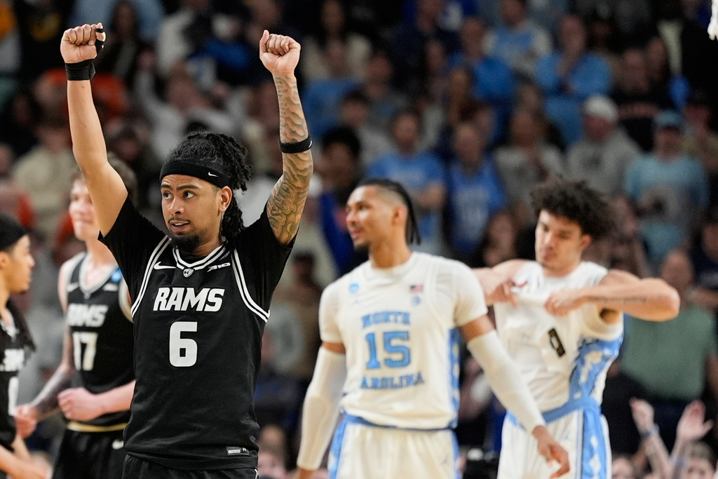 VCU guard Terrence Hill Jr. celebrates after scoring in overtime against North Carolina in the first round of the NCAA college basketball tournament, Thursday, March 19, 2026, in Greenville, S.C. (AP Photo/Chris Carlson)
