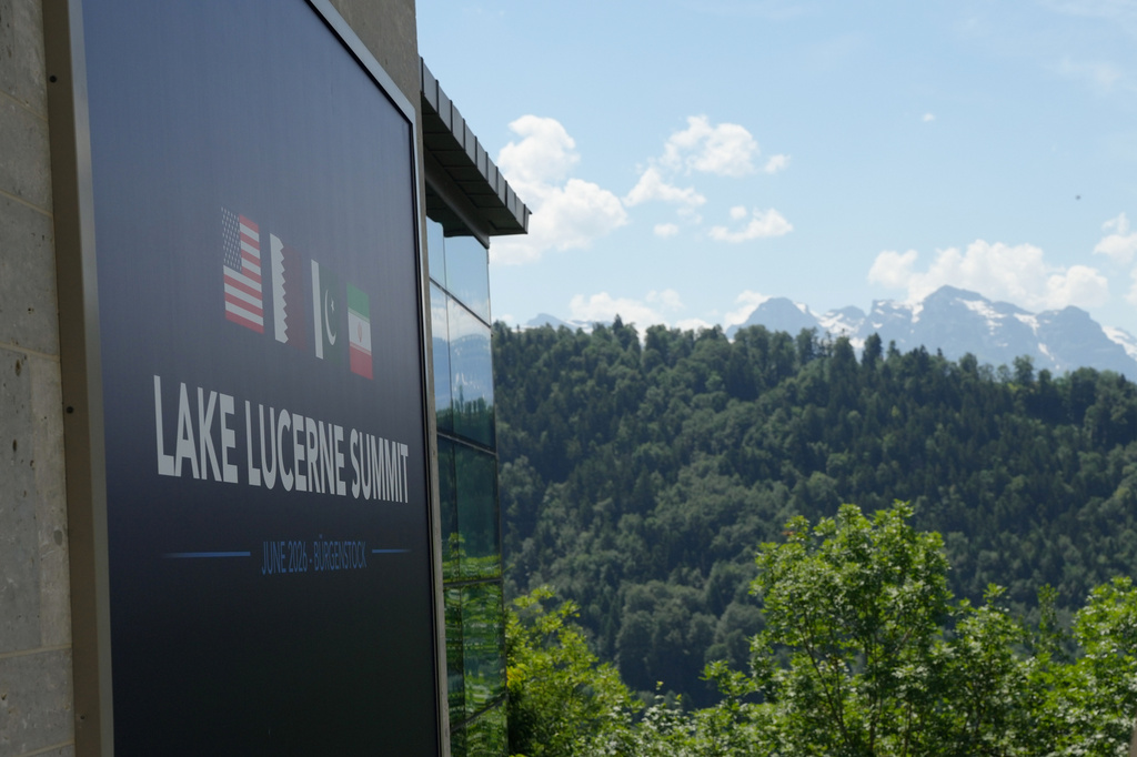 A sign for the Lake Lucerne Summit at the Bürgenstock during a meeting between U.S. Vice President JD Vance and Pakistan's Prime Minister Shehbaz Sharif for high-level talks aimed at advancing a deal to end the Middle East conflict, in Obbuergen, Switzerland, Sunday, June 21, 2026. (Nathan Howard/Pool Photo via AP)
