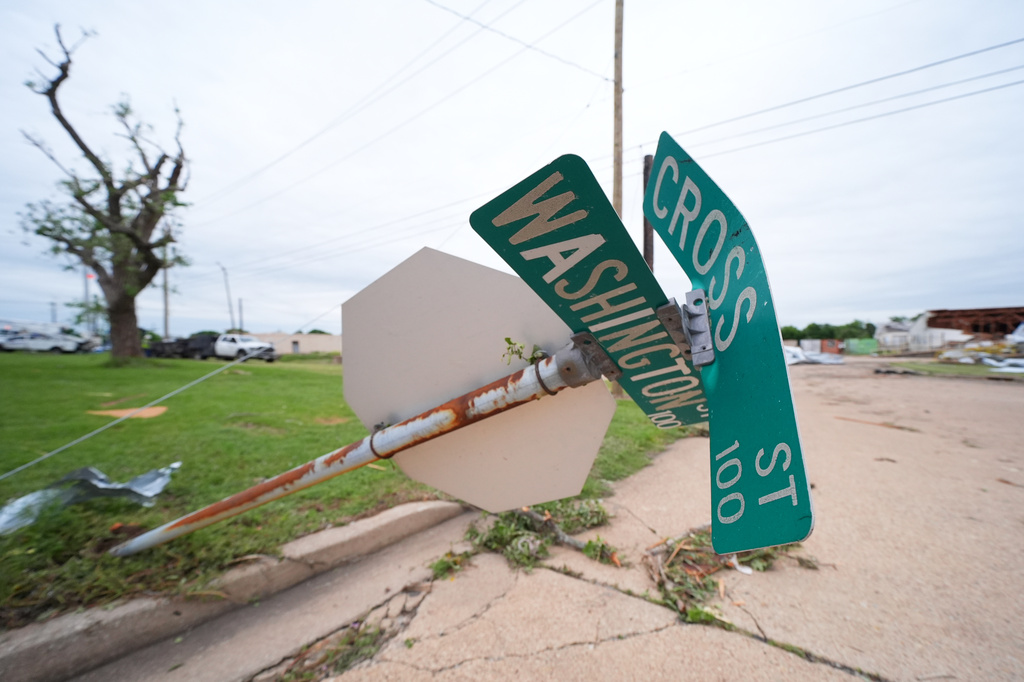 A downed street sign is visible following a storm in Mineral Wells, Texas, Wednesday, April 29, 2026. (AP Photo/Julio Cortez)