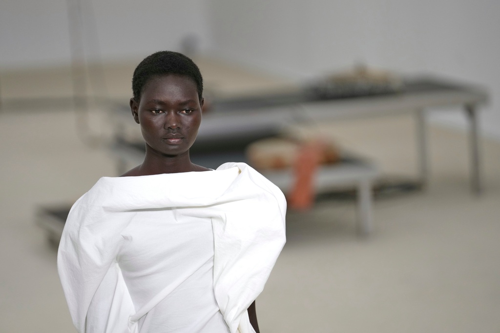A model wears a creation as part of the Issey Miyake Spring/Summer 2026 collection presented in Paris, Friday, Oct. 3, 2025. (AP Photo/Aurelien Morissard)
