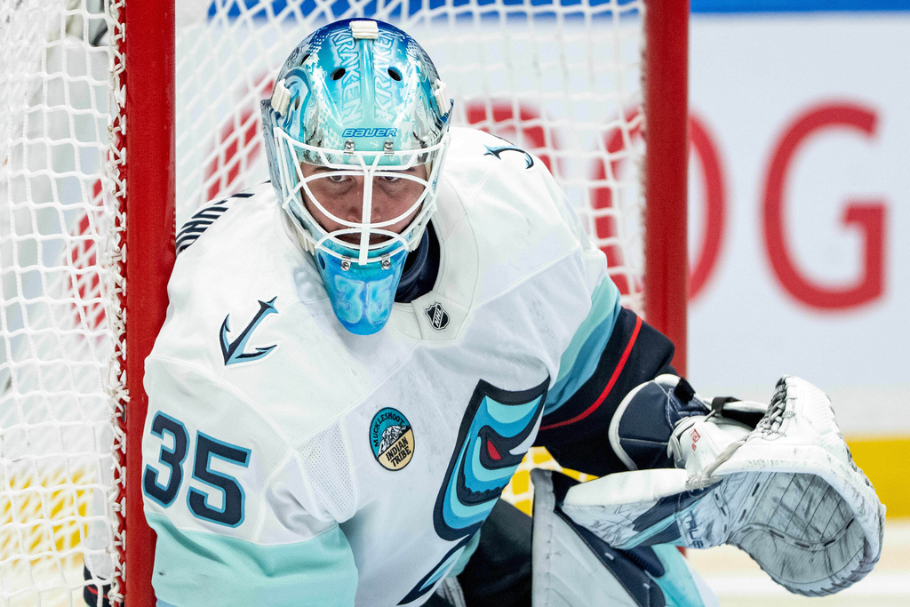 Seattle Kraken goaltender Joey Daccord (35) waits for a face off against the Vancouver Canucks during the third period of an NHL game in Vancouver, Friday, Jan. 2, 2026. (Ethan Cairns/The Canadian Press via AP)