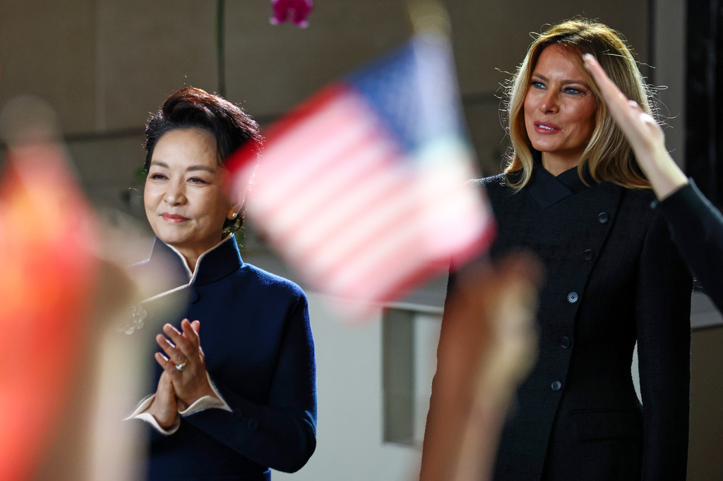 First lady of China Peng Liyuan, left, and first lady Melania Trump react as children perform during a visit to the Smithsonian's National Museum Of Asian Art, Thursday, Sept. 24, 2026, in Washington. (Finn Gomez/Pool Photo via AP)