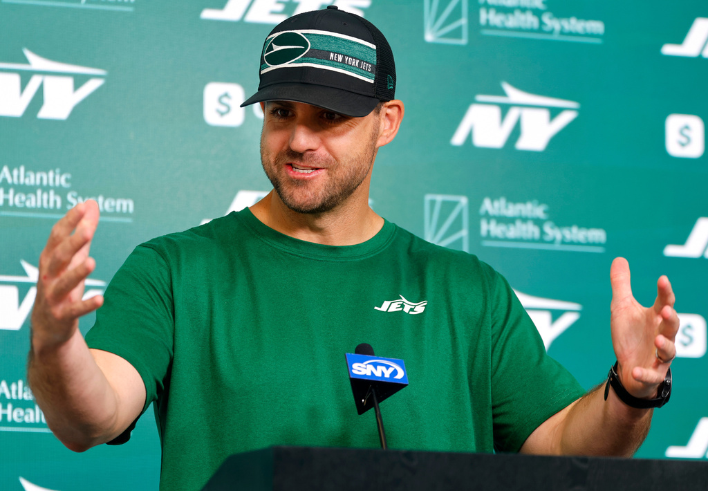 FILE - New York Jets offensive coordinator Tanner Engstrand answers questions from media at NFL minicamp football, June 11, 2025, in Florham Park, N.J. (AP Photo/Noah K. Murray, File)