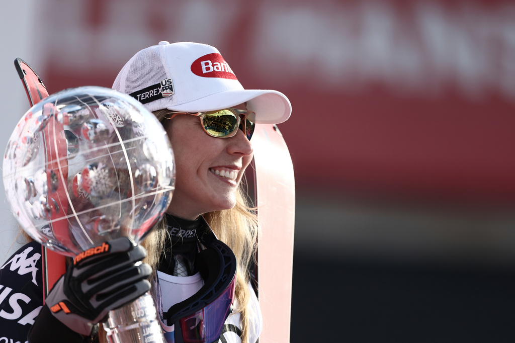 FILE - United States' Mikaela Shiffrin celebrates winning the women's overall World Cup skiing title, at the Lillehammer World Cup Finals, in Hafjell, Norway, Wednesday, March 25, 2026. (AP Photo/Gabriele Facciotti, File)