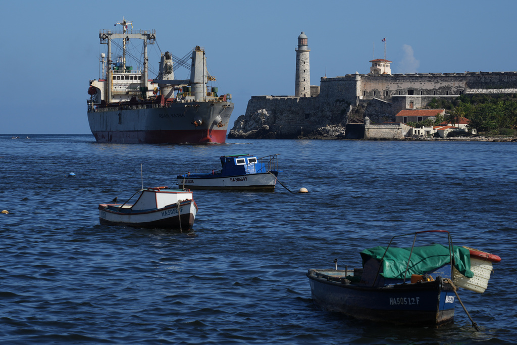 The Asian Katra cargo ship, top left, arrives in Havana Bay in Havana, Cuba, Monday, May 18, 2026. (AP Photo/Ramon Espinosa)