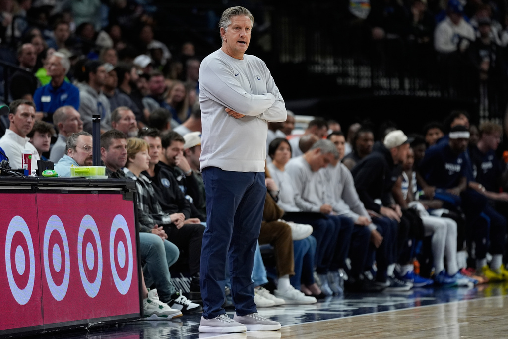 Minnesota Timberwolves head coach Chris Finch watches play during the first half of an NBA basketball preseason game against the Indiana Pacers, Tuesday, Oct. 7, 2025, in Minneapolis. (AP Photo/Abbie Parr)