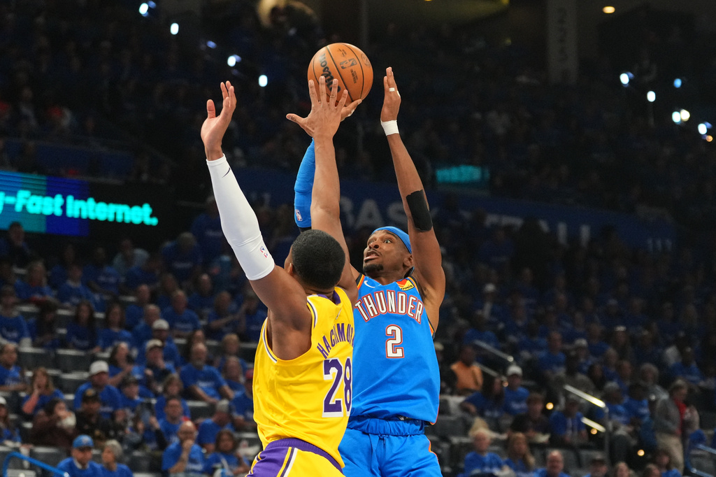 Oklahoma City Thunder guard Shai Gilgeous-Alexander (2) shoots over Los Angeles Lakers forward Rui Hachimura (28) in the second half of Game 1 in a second-round NBA basketball playoffs series Tuesday, May 5, 2026 in Oklahoma City. (AP Photo/Kyle Phillips)