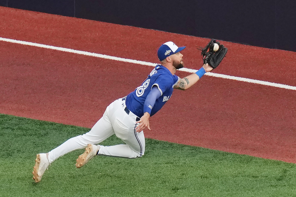 Toronto Blue Jays right fielder Nathan Lukes makes a catch for an out during the fifth inning against the New York Yankees in Game 1 of baseball's American League Division Series, Saturday, Oct. 4, 2025, in Toronto. (Chris Young/The Canadian Press via AP)
