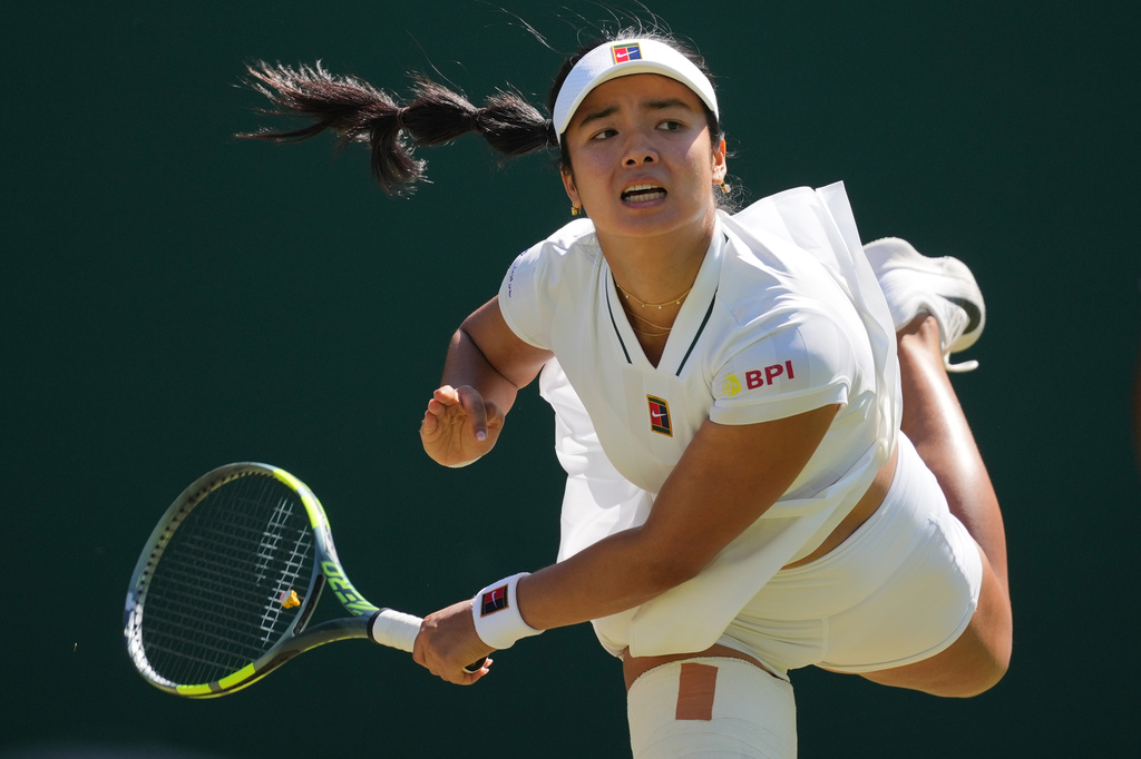 Alexandra Eala of the Philippines serves during the second round women's singles match against Maya Joint of Australia at the Wimbledon Tennis Championships in London, Thursday, July 2, 2026.(AP Photo/Kin Cheung)
