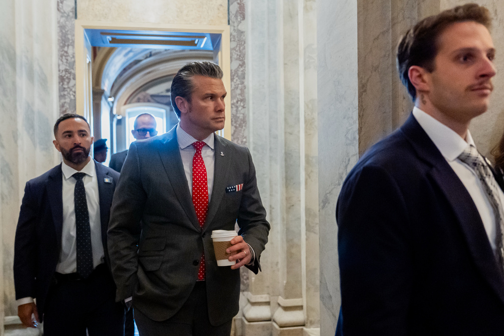 Defense Secretary Pete Hegseth departs the Capitol after briefing members of Congress on military strikes near Venezuela, Tuesday, Dec. 16, 2025, in Washington. (AP Photo/Julia Demaree Nikhinson)