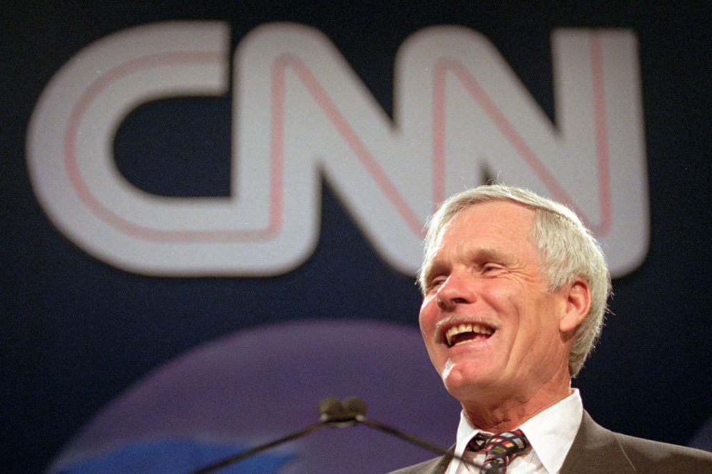 FILE - Ted Turner speaks during the CNN World Report Contributors banquet in Atlanta on May 4, 1995. (AP Photo/John Bazemore, File)