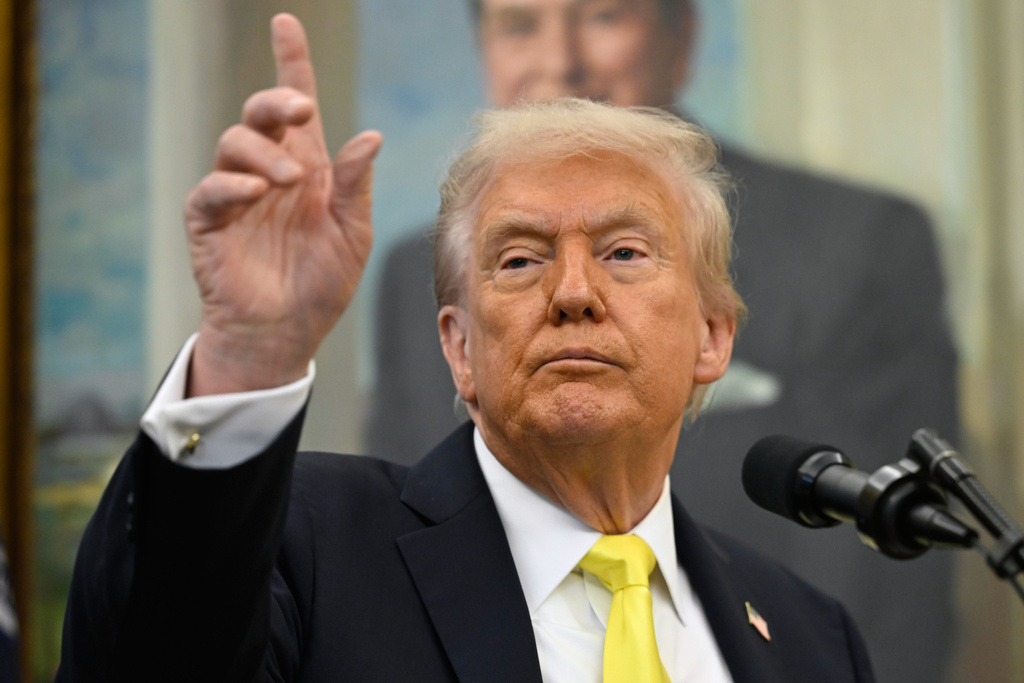 President Donald Trump speaks during an event in the Oval Office at the White House, Wednesday, Oct. 15, 2025, in Washington. (AP Photo/John McDonnell)