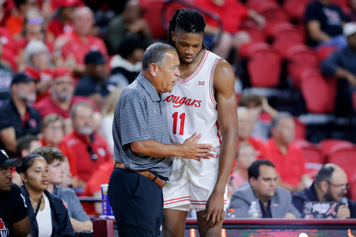 Houston head coach Kelvin Sampson, left, talks with forward Joseph Tugler (11) at the bench during the second half of an NCAA college basketball exhibition game against Mississippi State, Sunday, Oct. 26, 2025, in Rosenberg, Texas. (AP Photo/Michael Wyke) Houston head coach Kelvin Sampson, left, talks with forward Joseph Tugler (11) at the bench during the second half of an NCAA college basketball exhibition game against Mississippi State, Sunday, Oct. 26, 2025, in Rosenberg, Texas. (AP Photo/Michael Wyke)