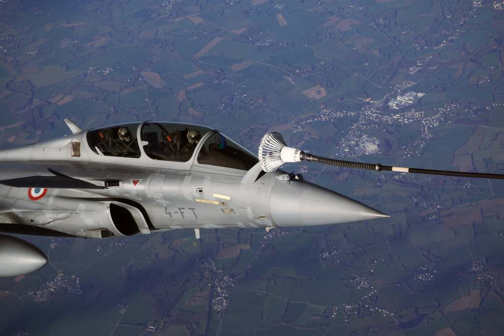 A Rafale aircraft takes part in a refueling operation moments before the arrival of French President Emmanuel Macron at the nuclear submarine navy base of Ile Longue in Crozon, France, Monday March 2, 2026.(Yoan Valat/Pool Photo via AP)