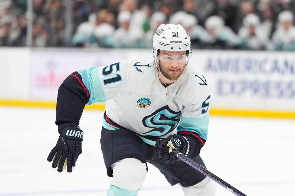 Seattle Kraken center Shane Wright (51) chases the puck during the third period of an NHL hockey game against the Los Angeles Kings Wednesday, Feb. 4, 2026, in Los Angeles. (AP Photo/Jae C. Hong)