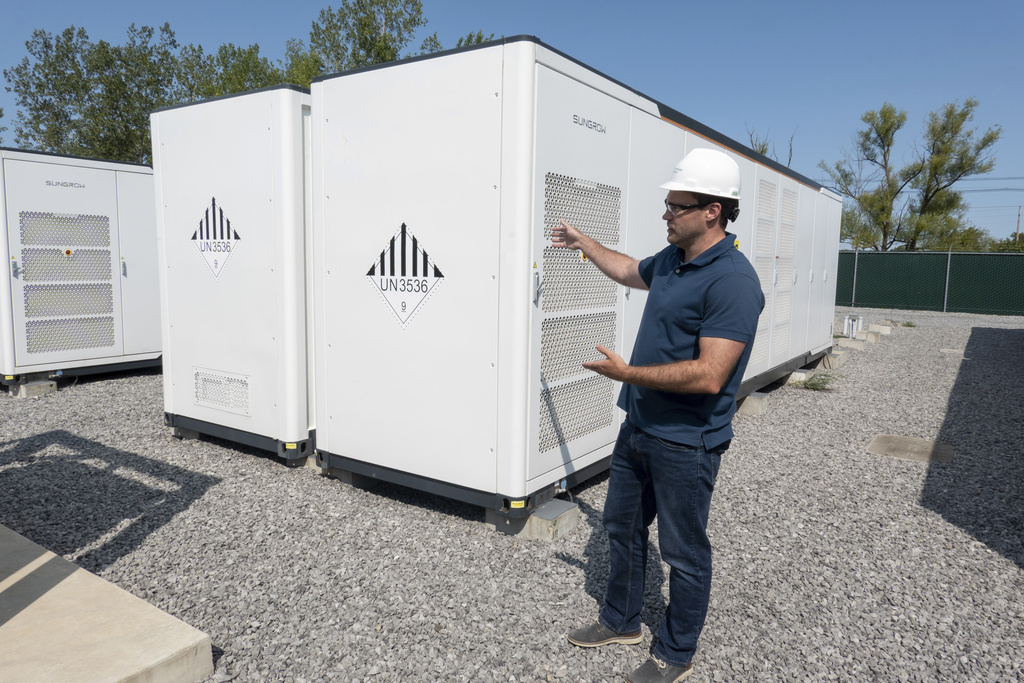 Chris Linsmayer, Key Capture Energy Public Affairs Manager, talks about the company's large lithium battery energy storage system, Tuesday, Sept. 9, 2025 in Blasdell, N.Y., which can power 15,000 homes for two hours during outages or high demand. (AP Photo/Ted Shaffrey)