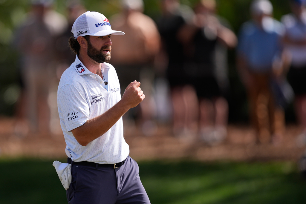 Cameron Young reacts after a putt on the ninth green during the third round of The Players Championship golf tournament Saturday, March 14, 2026, in Ponte Vedra Beach, Fla. (AP Photo/Gerald Herbert)