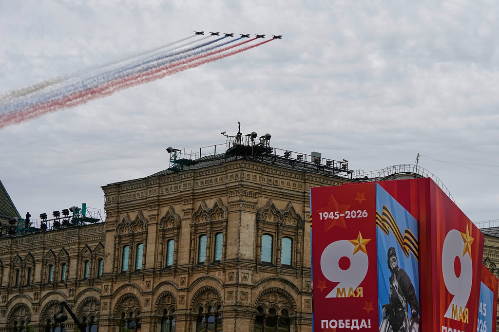 Russian Air Force Su-25 jets fly over Red Square leaving trails of smoke in the colors of the Russian state flag during the Victory Day military parade in Moscow, on Saturday, May 9, 2026, during celebrations of the 81st anniversary of the Soviet Union's victory over Nazi Germany during World War II. (AP Photo/Alexander Zemlianichenko, Pool)