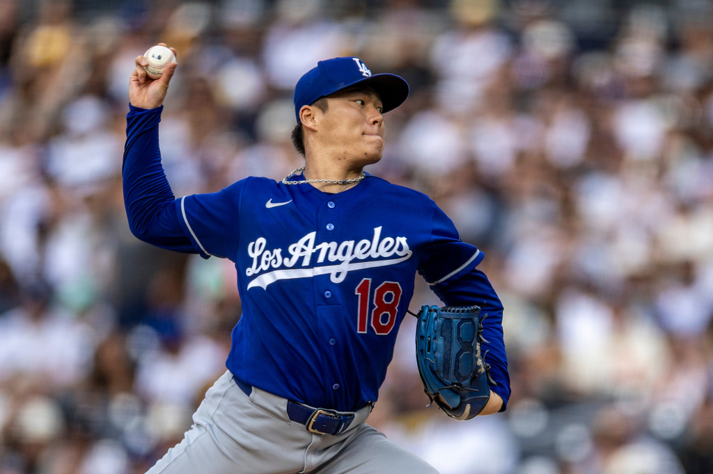 Los Angeles Dodgers starting pitcher Yoshinobu Yamamoto throws to a San Diego Padres batter in the first inning of a baseball game Saturday, June 27, 2026, in San Diego. (AP Photo/Tony Ding)