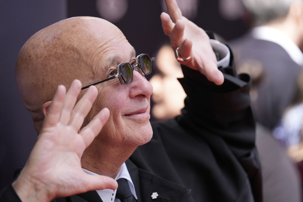 Paul Shaffer strikes a pose for photographers as he arrives for the film premiere "You Had to Be There" during the Toronto International Film Festival in Toronto, Saturday, Sept. 6, 2025. (AP Photo/Chris Pizzello)