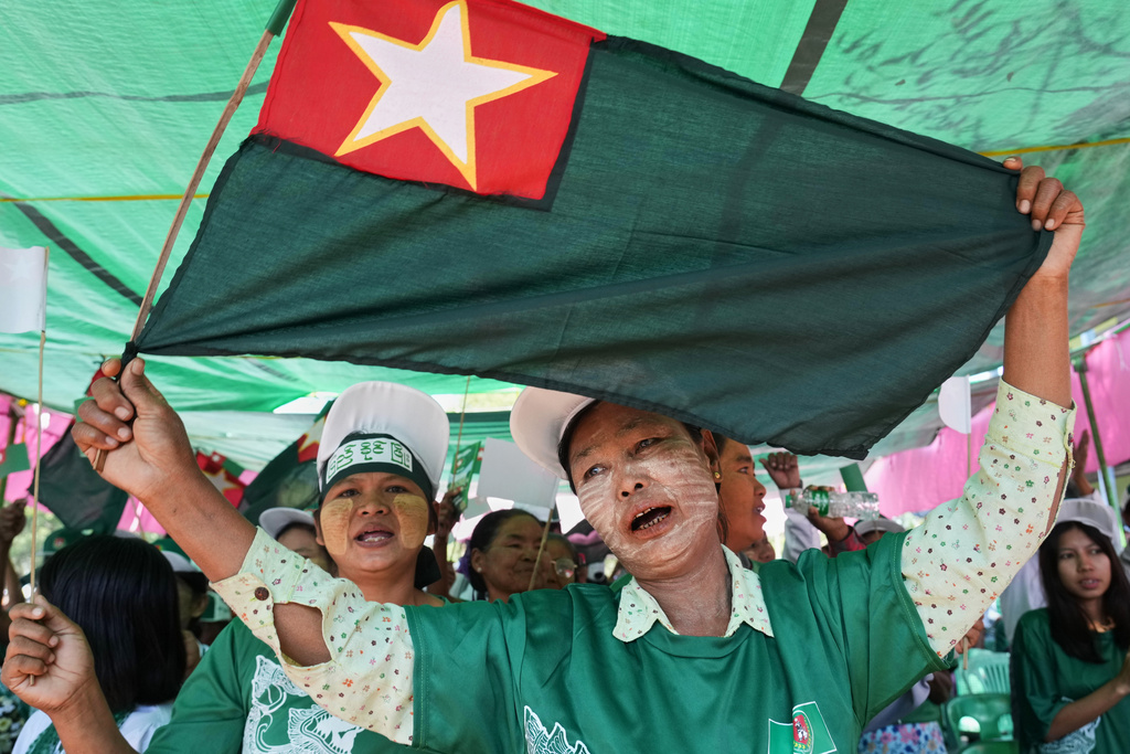FILE - Supporters of the military-backed Union Solidarity and Development Party (USDP) dance during an election campaign in Wundwin Township, Mandalay Division, central Myanmar, Wednesday, Jan. 7, 2026. (AP Photo/Aung Shine Oo, File)