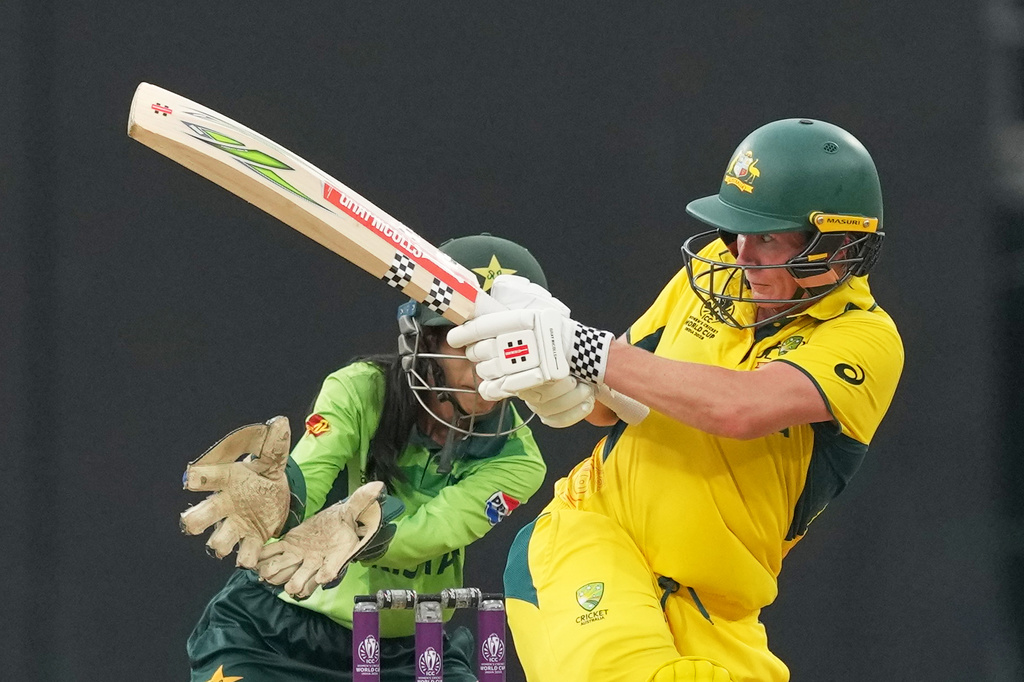 Australia's Beth Mooney plays a shot during the ICC Women's Cricket World Cup match between Australia and Pakistan at Premadasa Stadium in Colombo, Sri Lanka, Wednesday, Oct, 8, 2025. (AP Photo/Eranga Jayawardena)